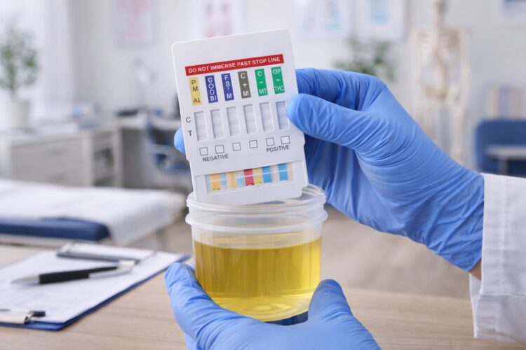 person holding a dip card test